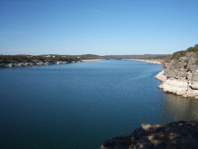 Blue water and limestone cliffs on Lake Travis at Pace Bend Park in Spicewood